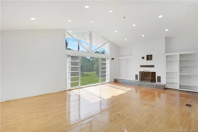 a view of a livingroom with a fireplace