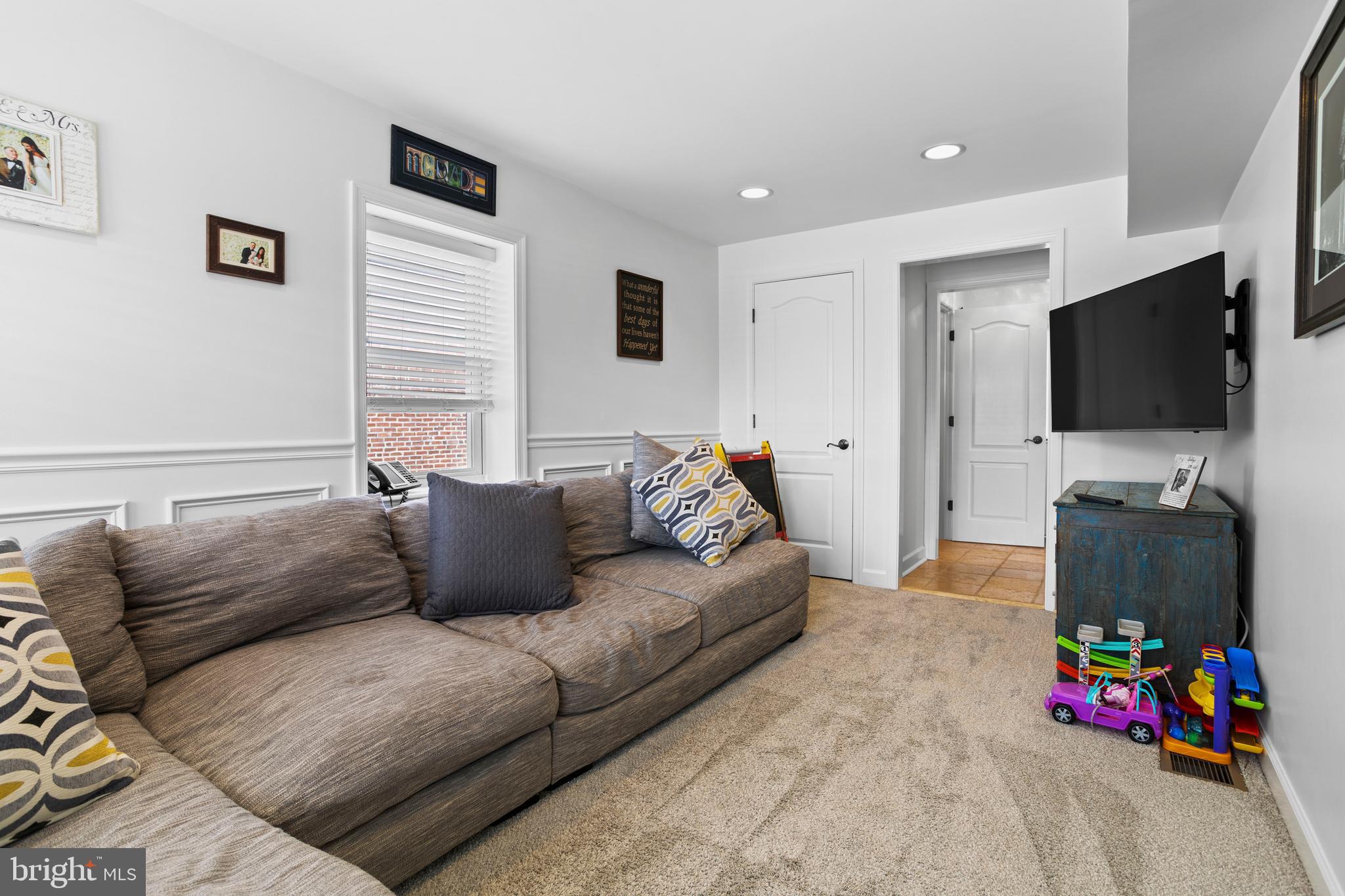 46 Plymouth Road Springfield, PA 19064 - Photo 13 of 30 a living room with furniture and a flat screen tv
