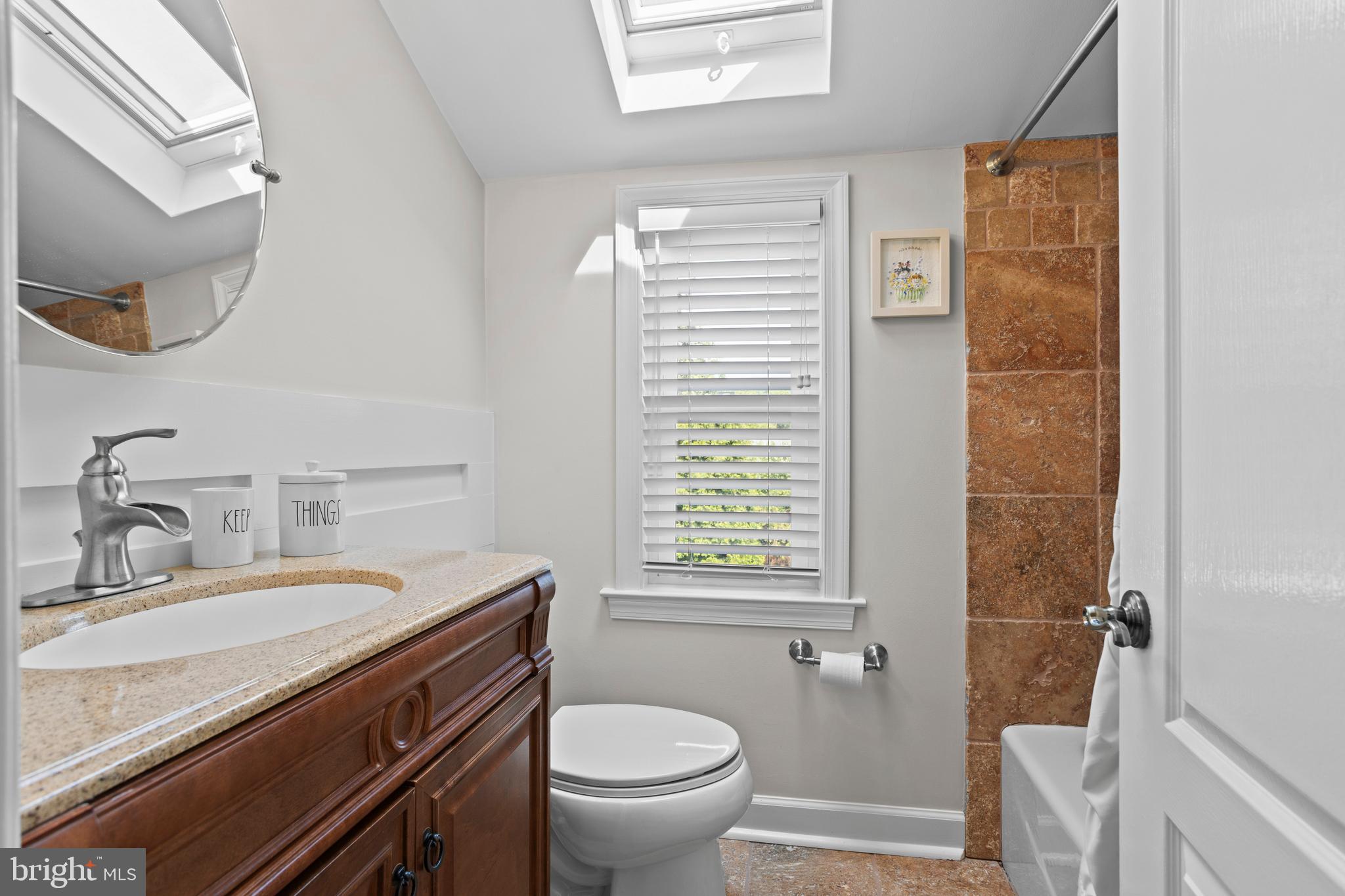 46 Plymouth Road Springfield, PA 19064 - Photo 17 of 30 a bathroom with a granite countertop sink toilet and shower