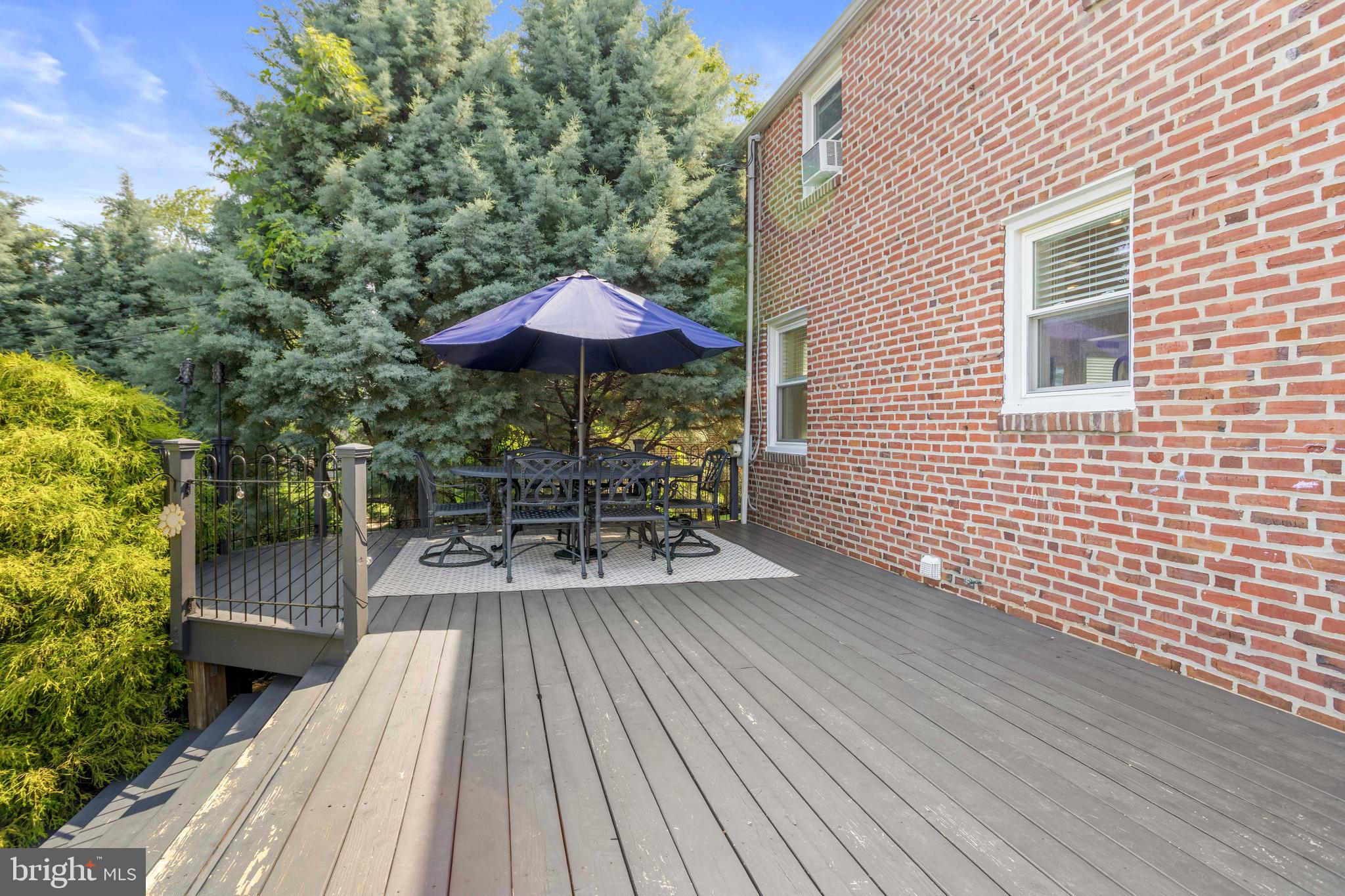 46 Plymouth Road Springfield, PA 19064 - Photo 24 of 30 a view of house with wooden floor and outdoor seating