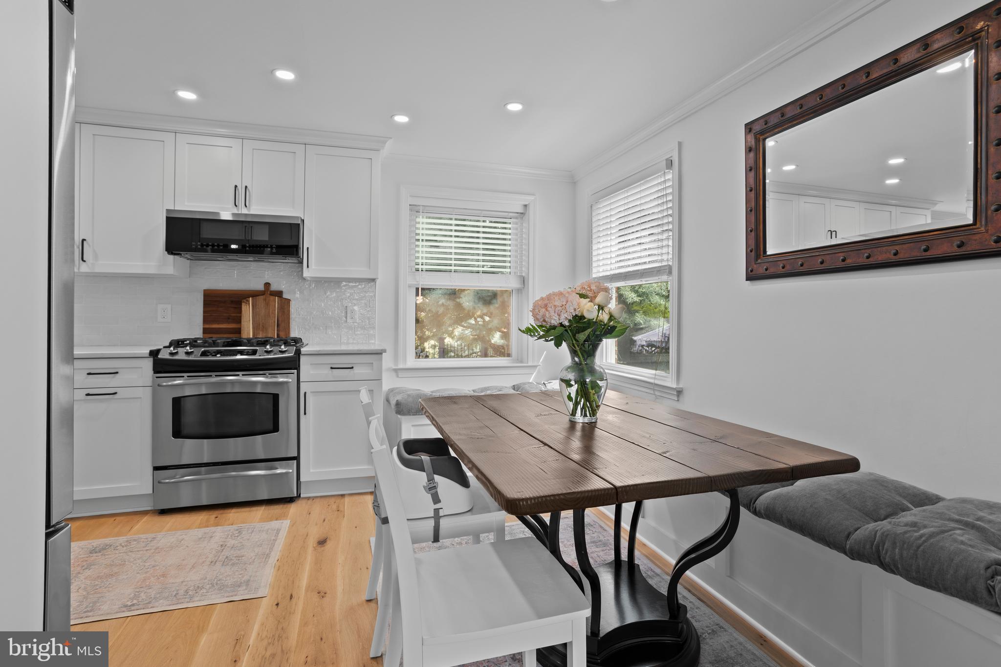 46 Plymouth Road Springfield, PA 19064 - Photo 8 of 30 a view of a dining room with furniture and wooden floor