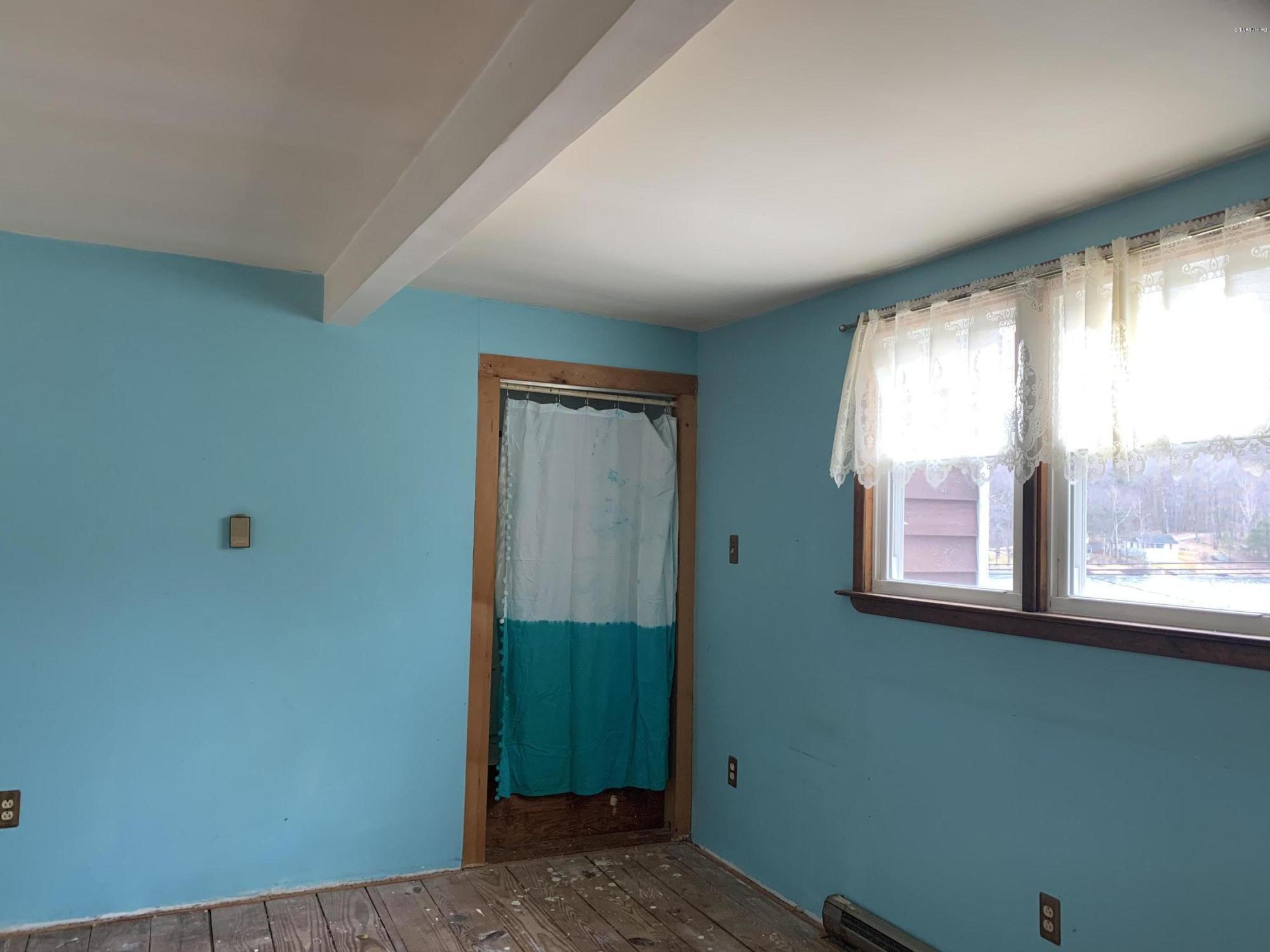 3582 Jacobs Ladder Road Becket, MA 01223 - Photo 15 of 32 a view of a room that has a window in it