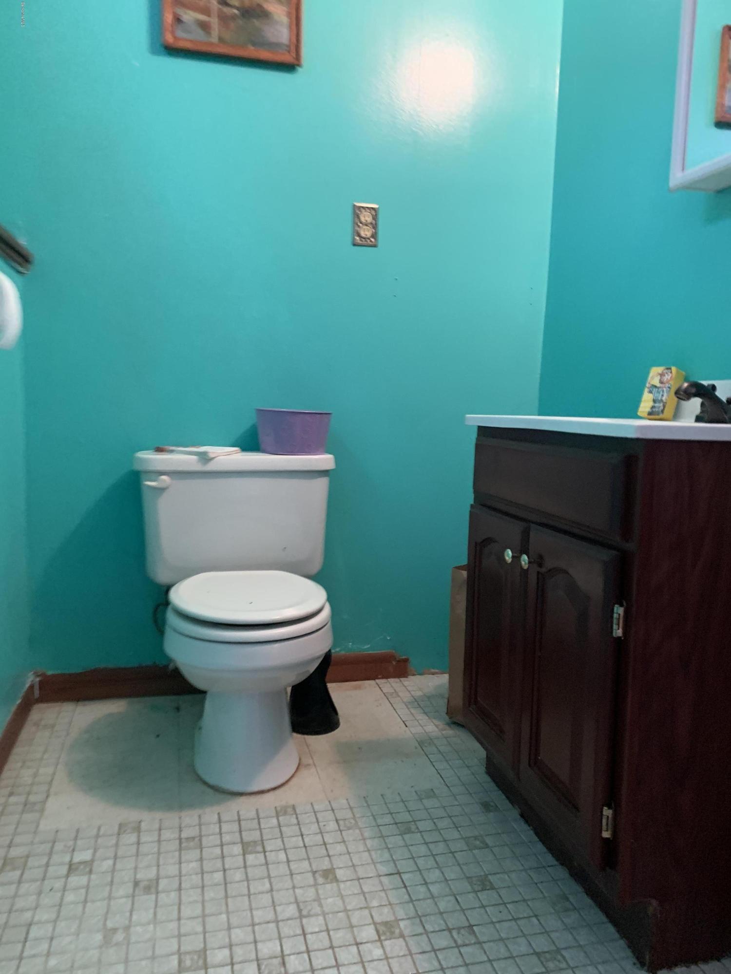 3582 Jacobs Ladder Road Becket, MA 01223 - Photo 18 of 32 a bathroom with a toilet and a sink