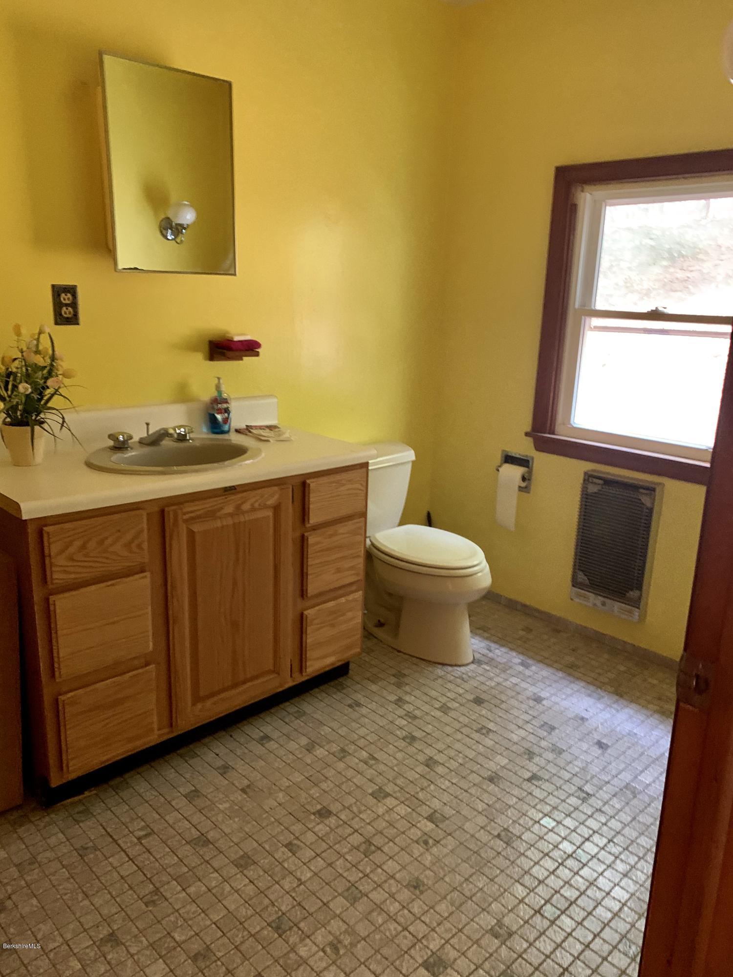 3582 Jacobs Ladder Road Becket, MA 01223 - Photo 22 of 32 a bathroom with a sink and a toilet
