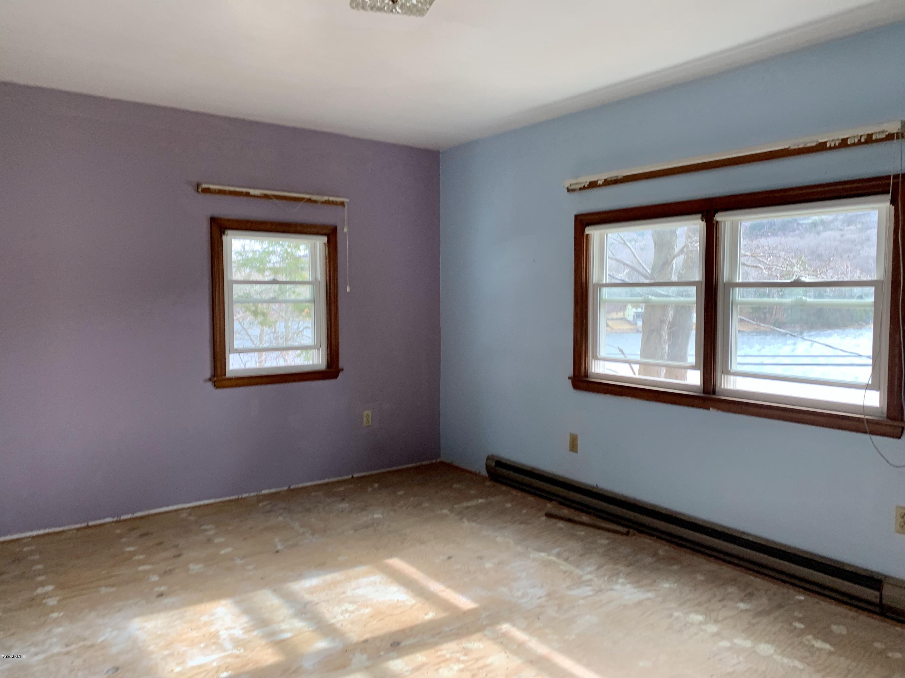 3582 Jacobs Ladder Road Becket, MA 01223 - Photo 23 of 32 a view of an empty room with a window