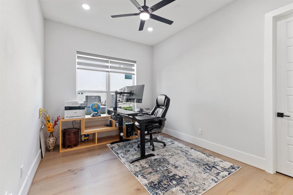 11991 Cloverdale Road Frisco, TX 75035 - Photo 12 of 40 a view of a workspace with furniture and a window