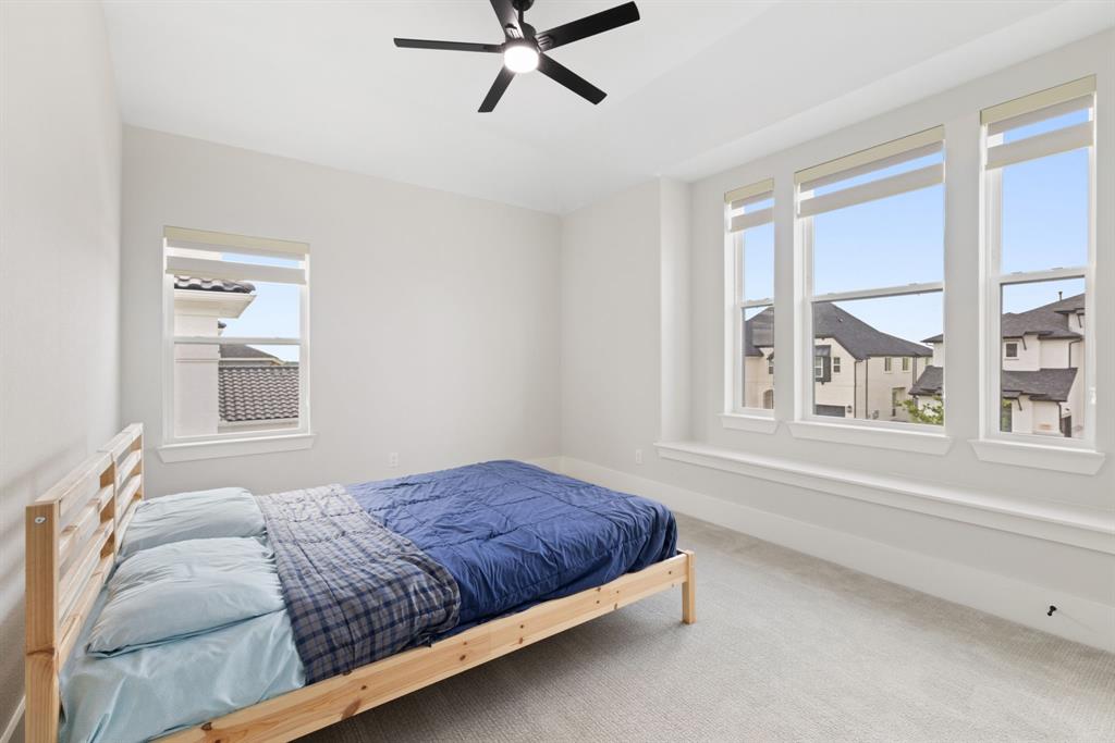 11991 Cloverdale Road Frisco, TX 75035 - Photo 33 of 40 a bedroom with a bed and a window