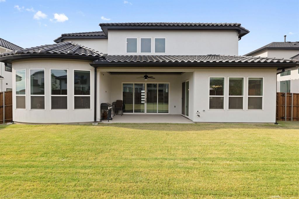 11991 Cloverdale Road Frisco, TX 75035 - Photo 35 of 40 a view of a house with a swimming pool