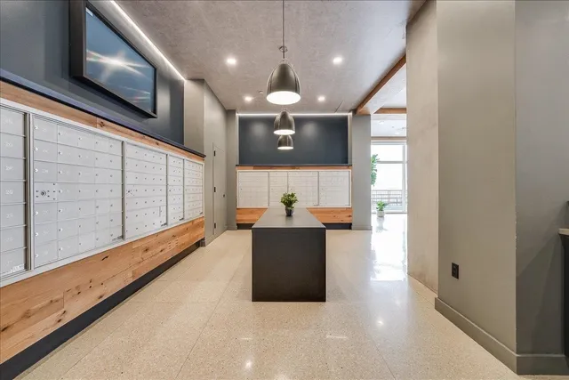a view of living room with furniture and a flat screen tv