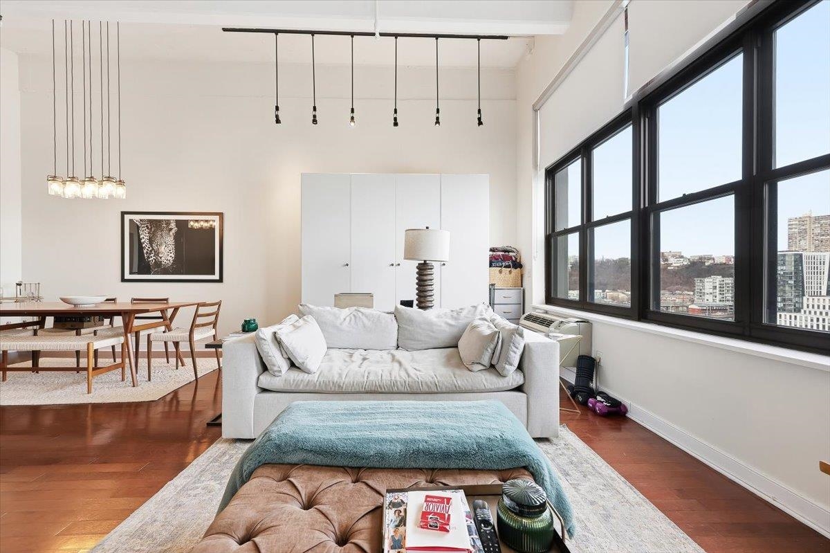 1500 Washington Street, Unit 8K Hoboken, NJ 07030 - Photo 3 of 43 a living room with furniture and a large window