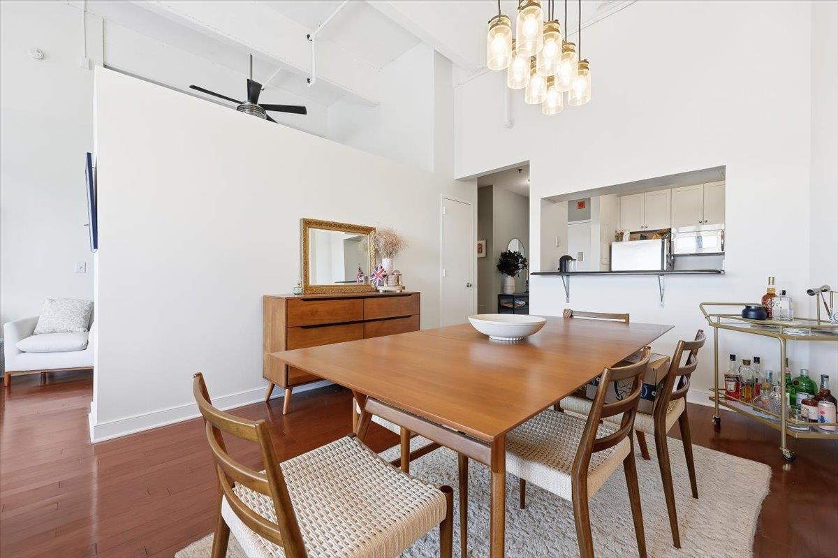 1500 Washington Street, Unit 8K Hoboken, NJ 07030 - Photo 9 of 43 a view of a dining room with furniture and wooden floor