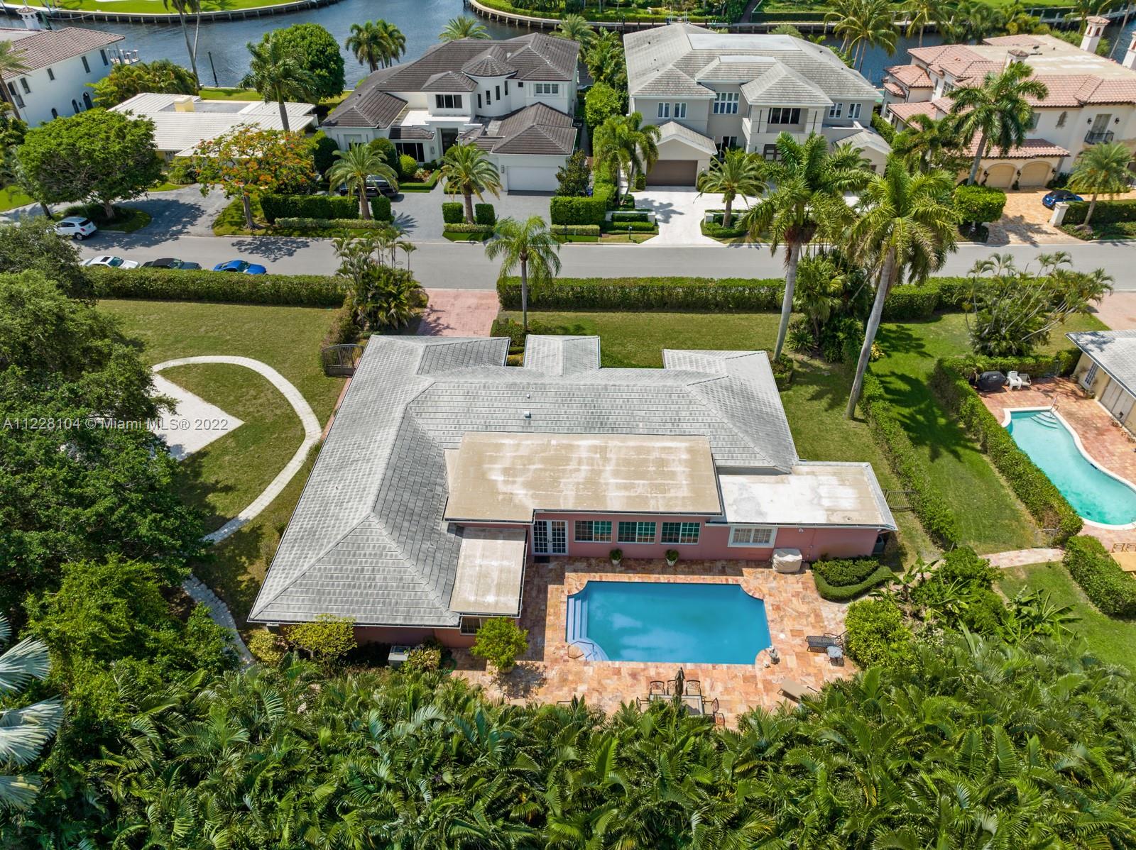 2498 Queen Palm Road Boca Raton, FL 33432 - Photo 18 of 29 an aerial view of a house with swimming pool yard and outdoor seating