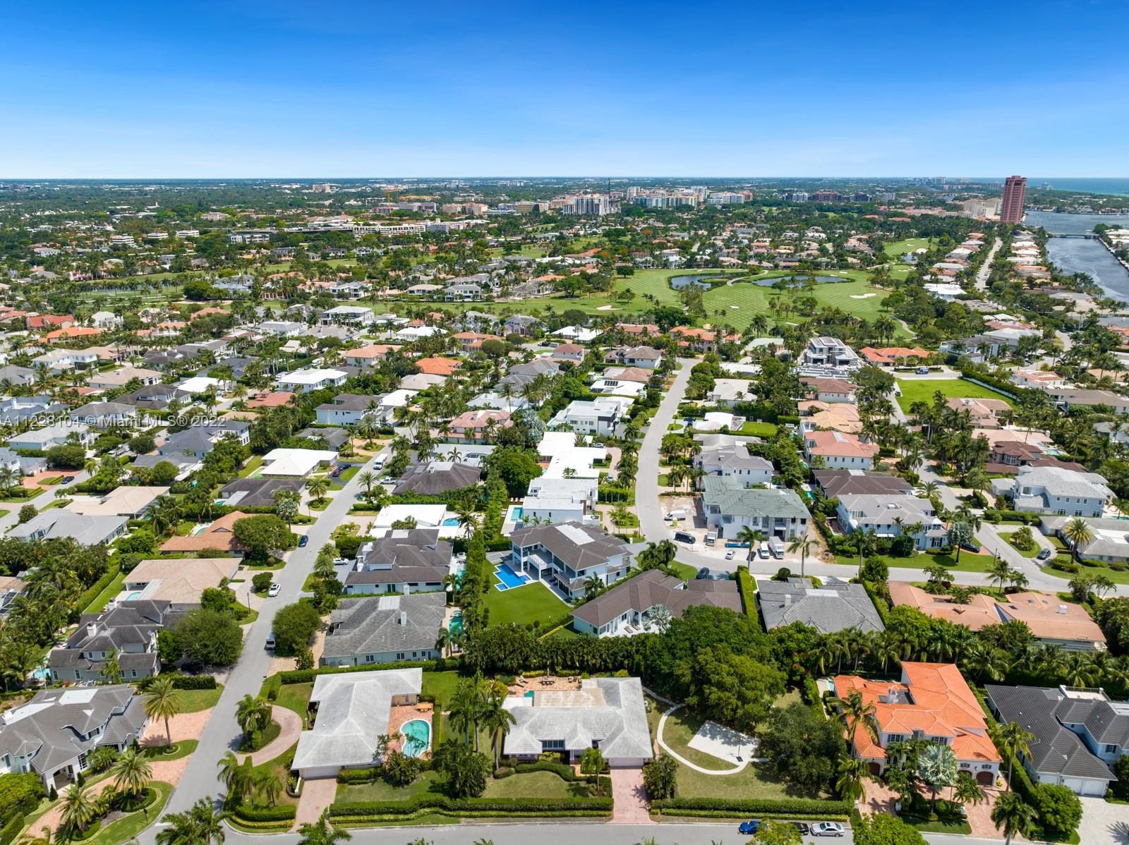 2498 Queen Palm Road Boca Raton, FL 33432 - Photo 23 of 29 an aerial view of residential houses with outdoor space and trees