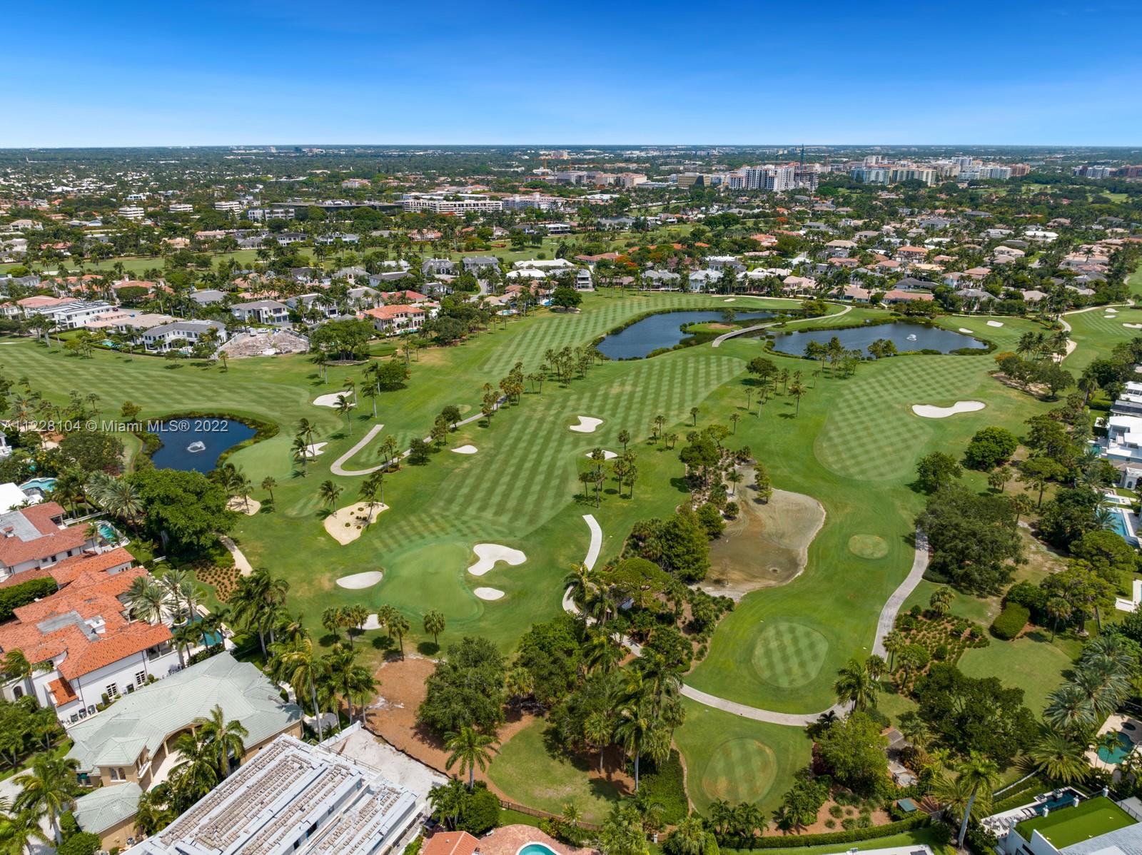 2498 Queen Palm Road Boca Raton, FL 33432 - Photo 24 of 29 an aerial view of residential houses with outdoor space and trees