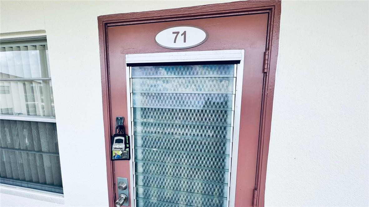 71 Preston F, Unit 71B Boca Raton, FL 33434 - Photo 42 of 42 FRONT DOOR ENTRY