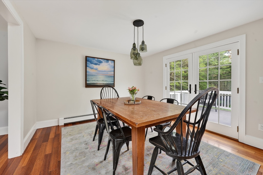 59 First Parish Road Norwell, MA 02061 - Photo 6 of 37 a view of a dining room with furniture window and wooden floor