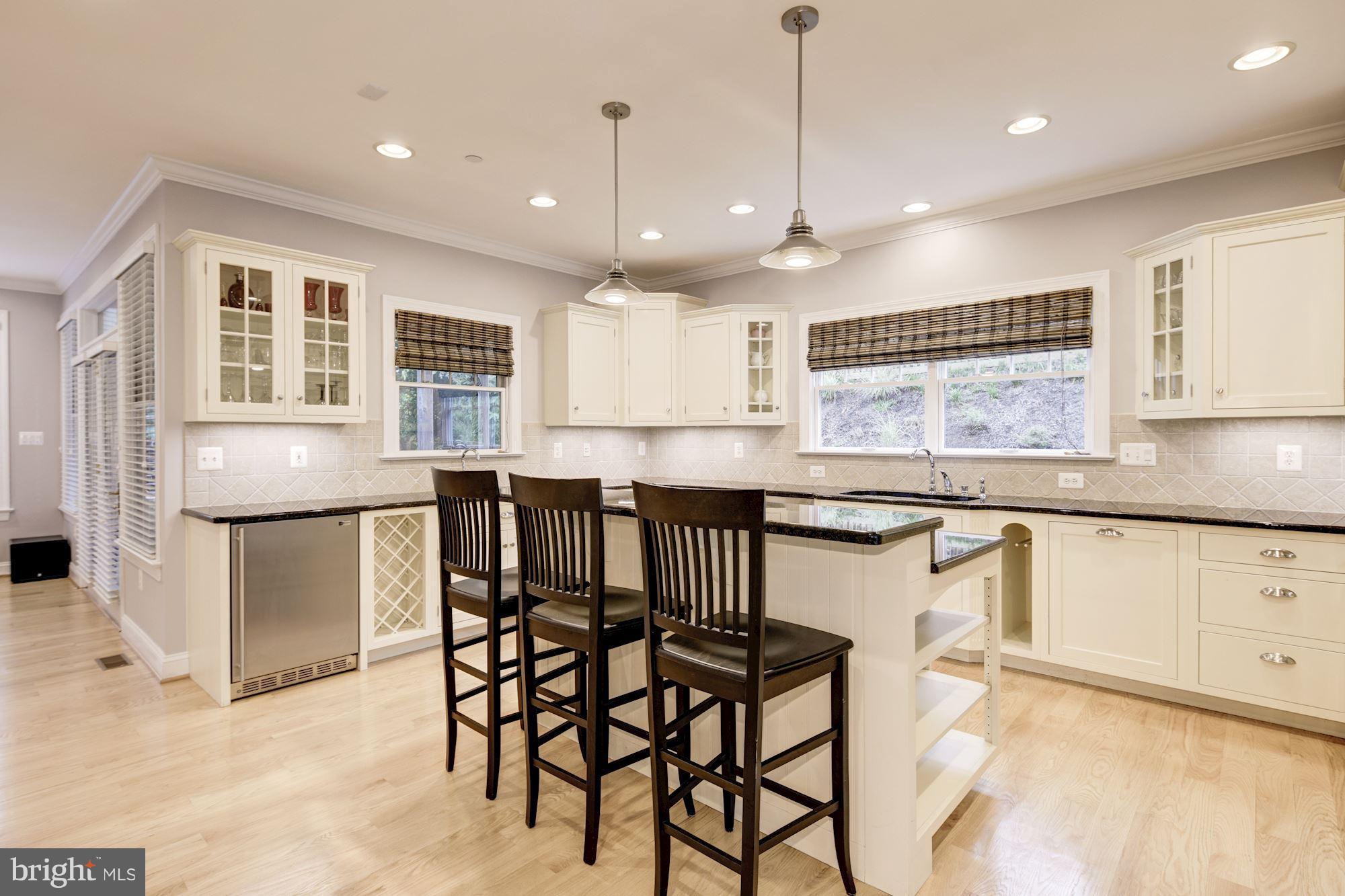 390 Ridgely Avenue Annapolis, MD 21401 - Photo 5 of 32 Open Plan Kitchen and Breakfast Bar