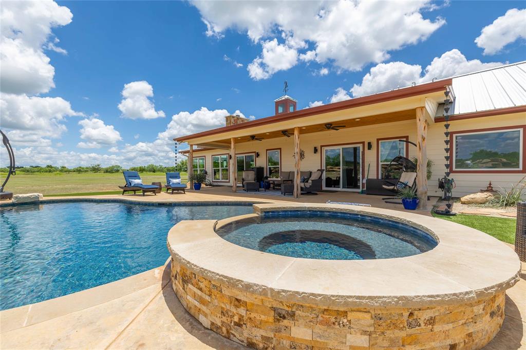 1010 Fm 583 Street West Rising Star, TX 76471 - Photo 11 of 40 a view of a swimming pool with an outdoor seating