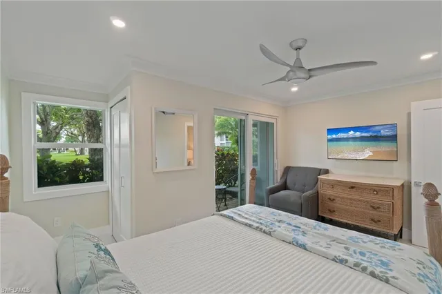 a bedroom with furniture and windows