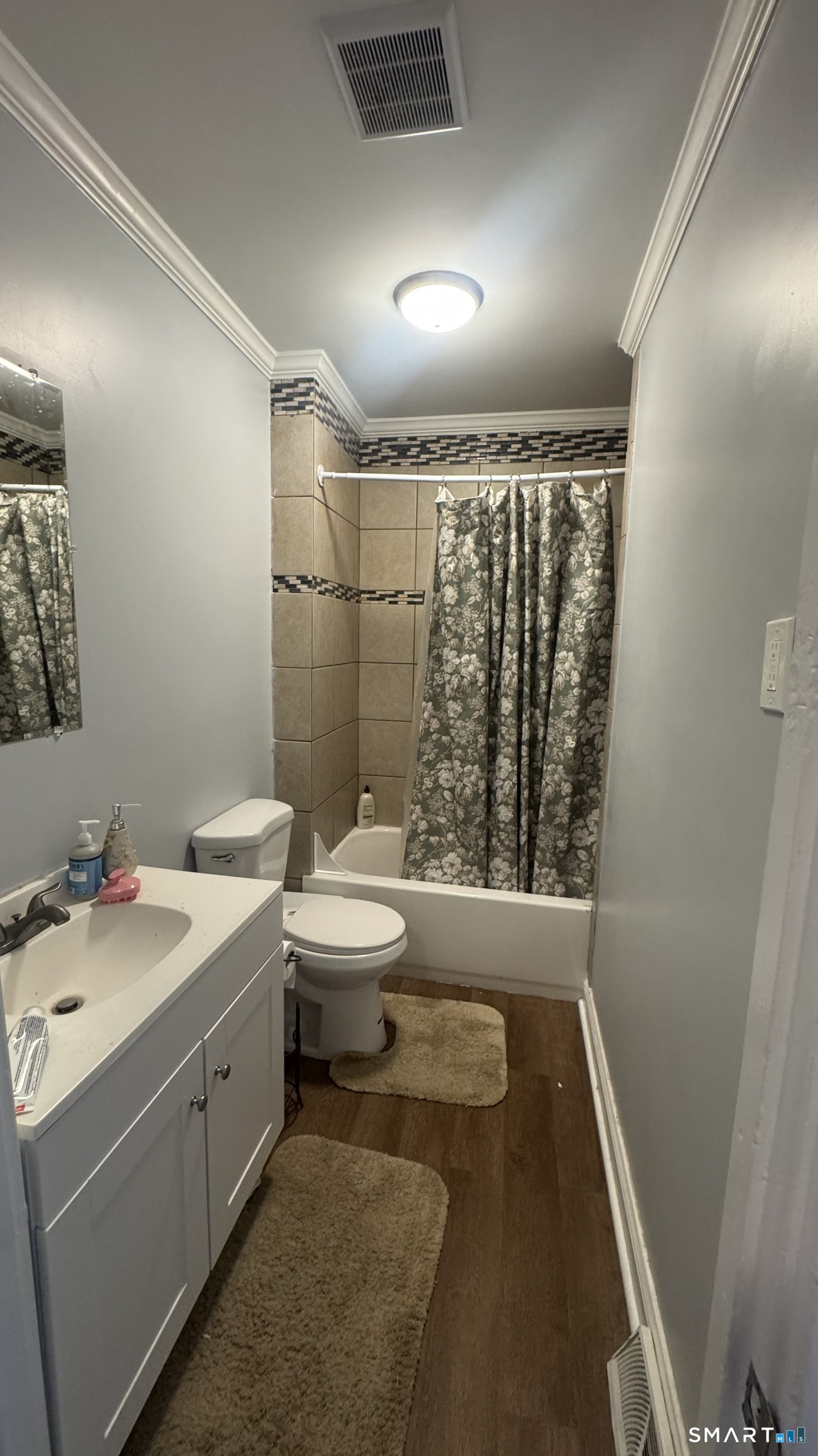104 Prospect Street Ansonia, CT 06401 - Photo 36 of 40 a bathroom with a sink a toilet and shower