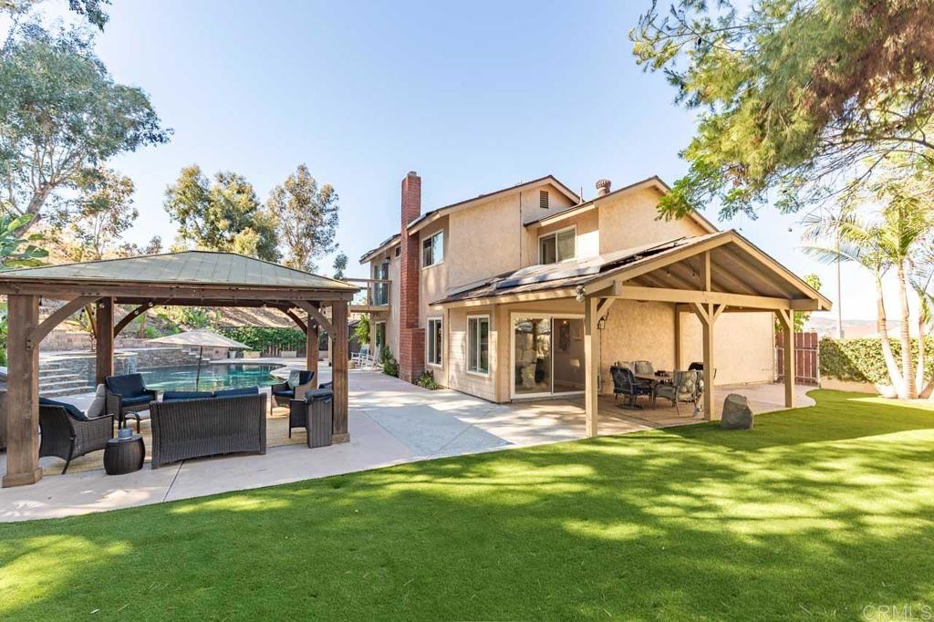 11061 Crystal Springs Road Santee, CA 92071 - Photo 27 of 30 a view of a house with a yard patio and sitting area
