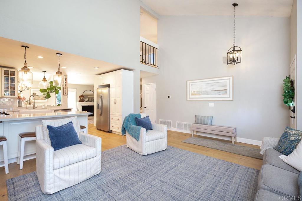 11061 Crystal Springs Road Santee, CA 92071 - Photo 7 of 30 a living room with furniture and a wooden floor