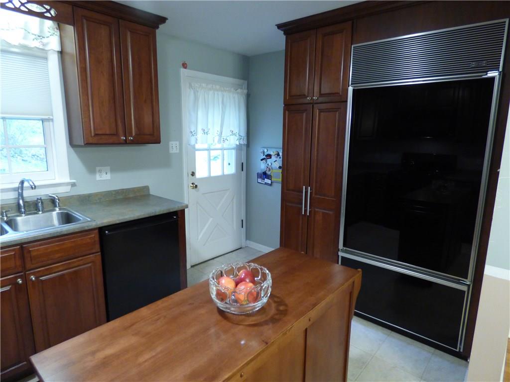 100 Bell Court Road McKees Rocks, PA 15136 - Photo 3 of 23 Sub Zero Refrigerator and more cabinets. Door to side yard.