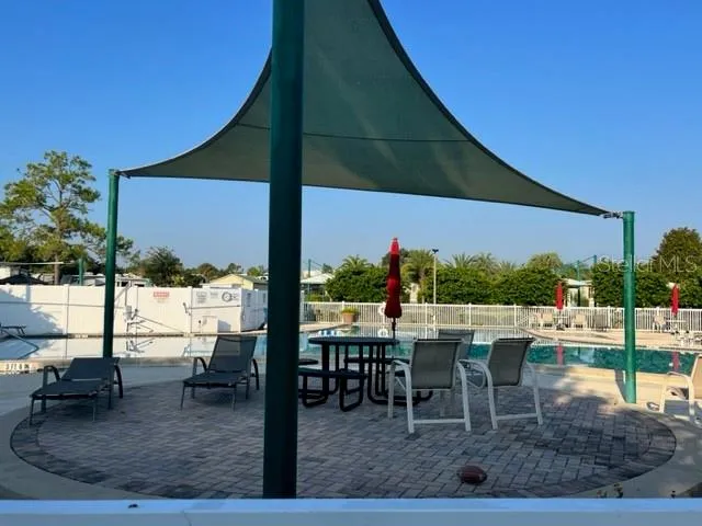 a view of a garden with an outdoor space