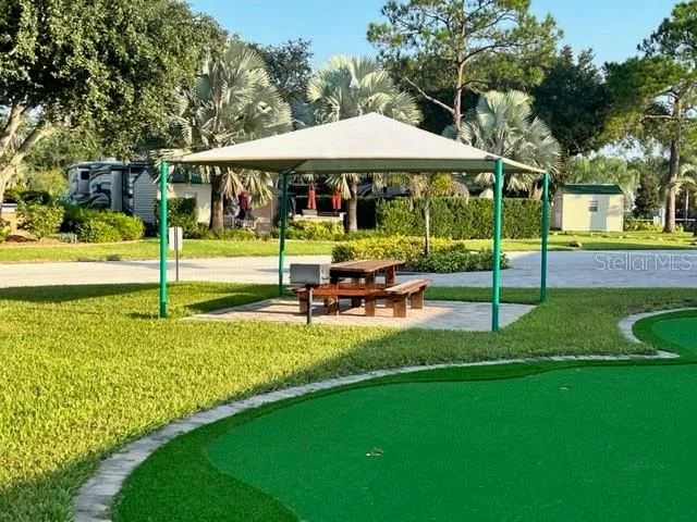 a view of a swimming pool with a sitting space