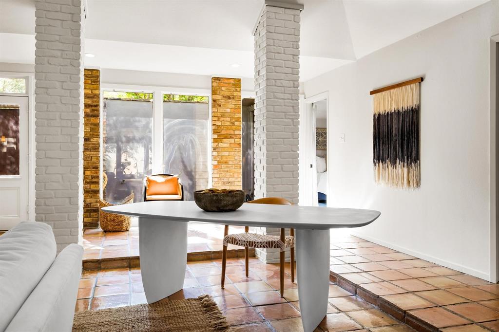 4338 Travis Street Dallas, TX 75205 - Photo 5 of 17 a view of a dining room with furniture and window