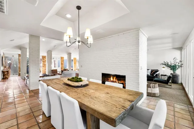 a outdoor space with furniture and fireplace