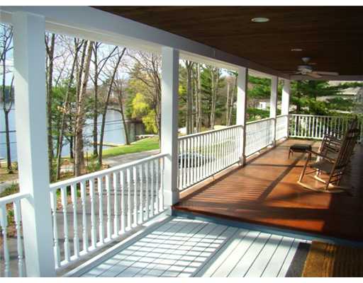 View. Mahogany wrap around covered porch overlooking Slacks Pond.
