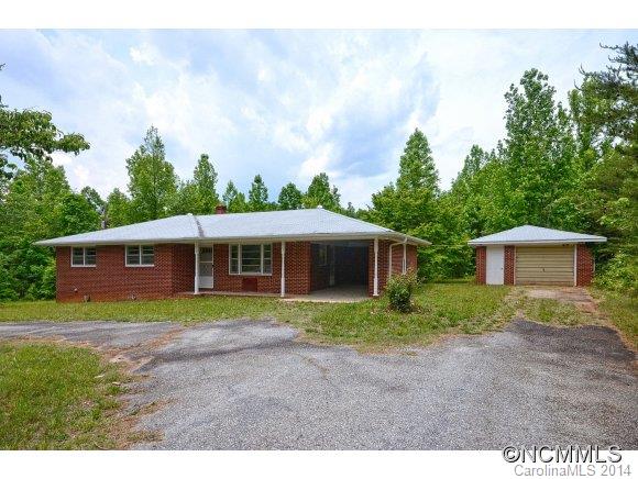 517 Tugaloo Road Landrum, SC 29356 - Photo 1 of 14 a view of outdoor space with a garden