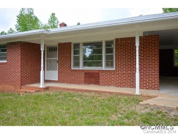 517 Tugaloo Road Landrum, SC 29356 - Photo 2 of 14 a front view of a house with a yard