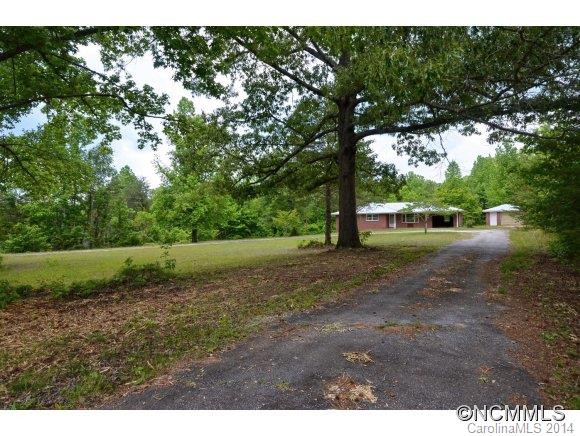 517 Tugaloo Road Landrum, SC 29356 - Photo 14 of 14 a view of a yard with a tree