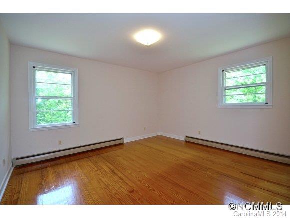 517 Tugaloo Road Landrum, SC 29356 - Photo 7 of 14 a view of an empty room with a window