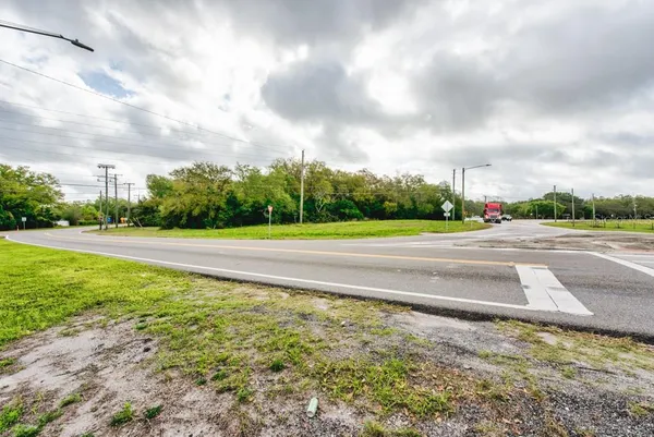 a view of a yard with an outdoor space