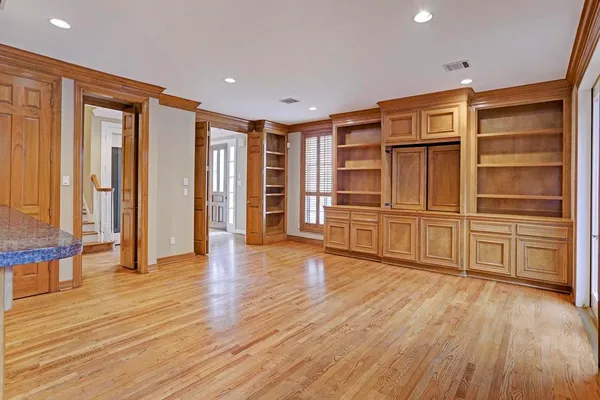 a view of a livingroom with wooden floor