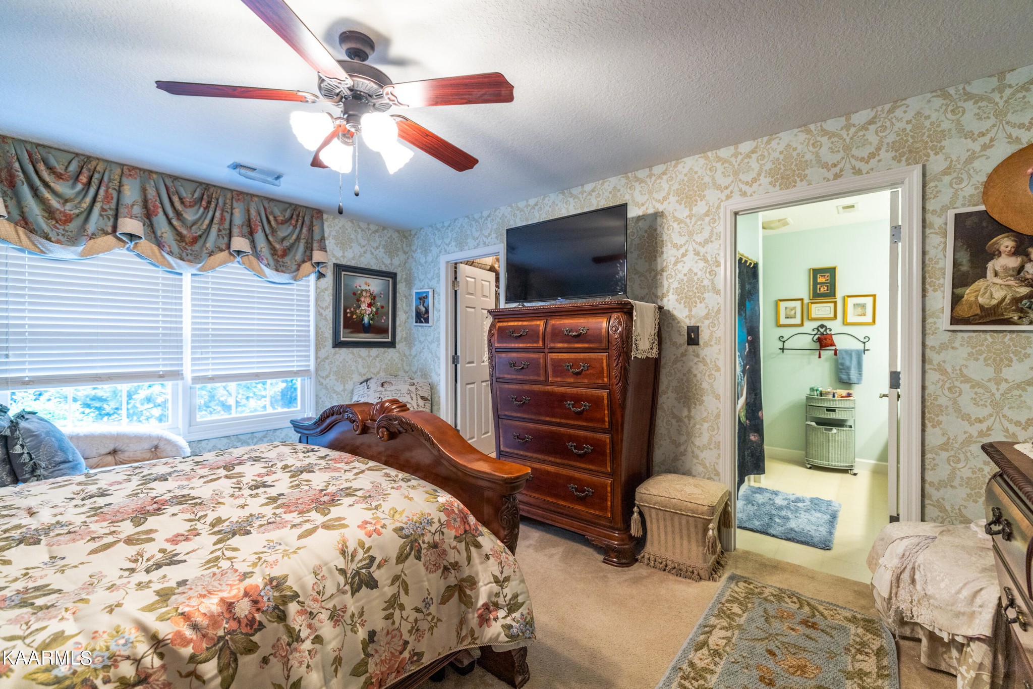 9043 Rocky Ridge Way, Unit 9 Knoxville, TN 37924 - Photo 15 of 31 a bedroom with a bed dresser and a window