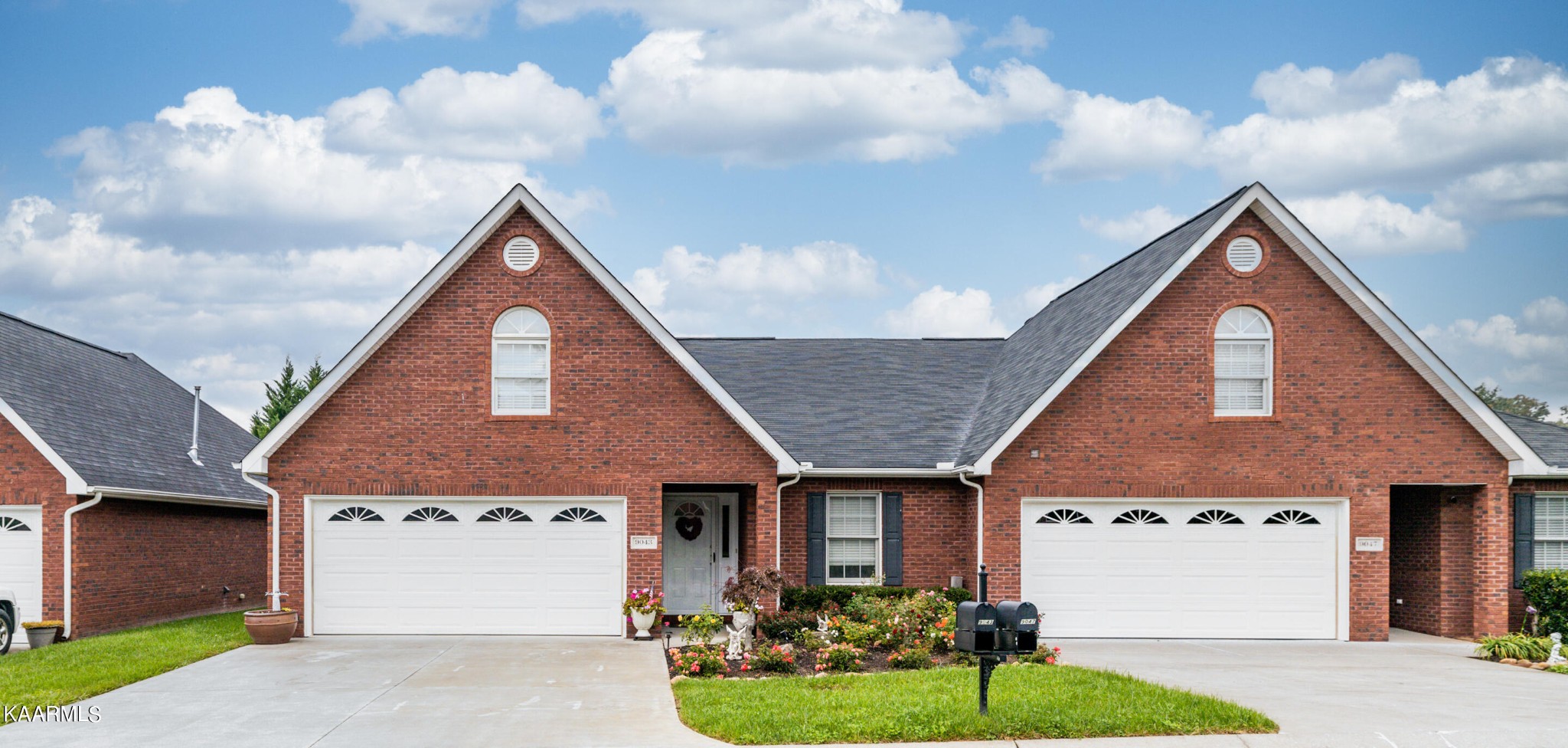 9043 Rocky Ridge Way, Unit 9 Knoxville, TN 37924 - Photo 2 of 31 a front view of a house with yard