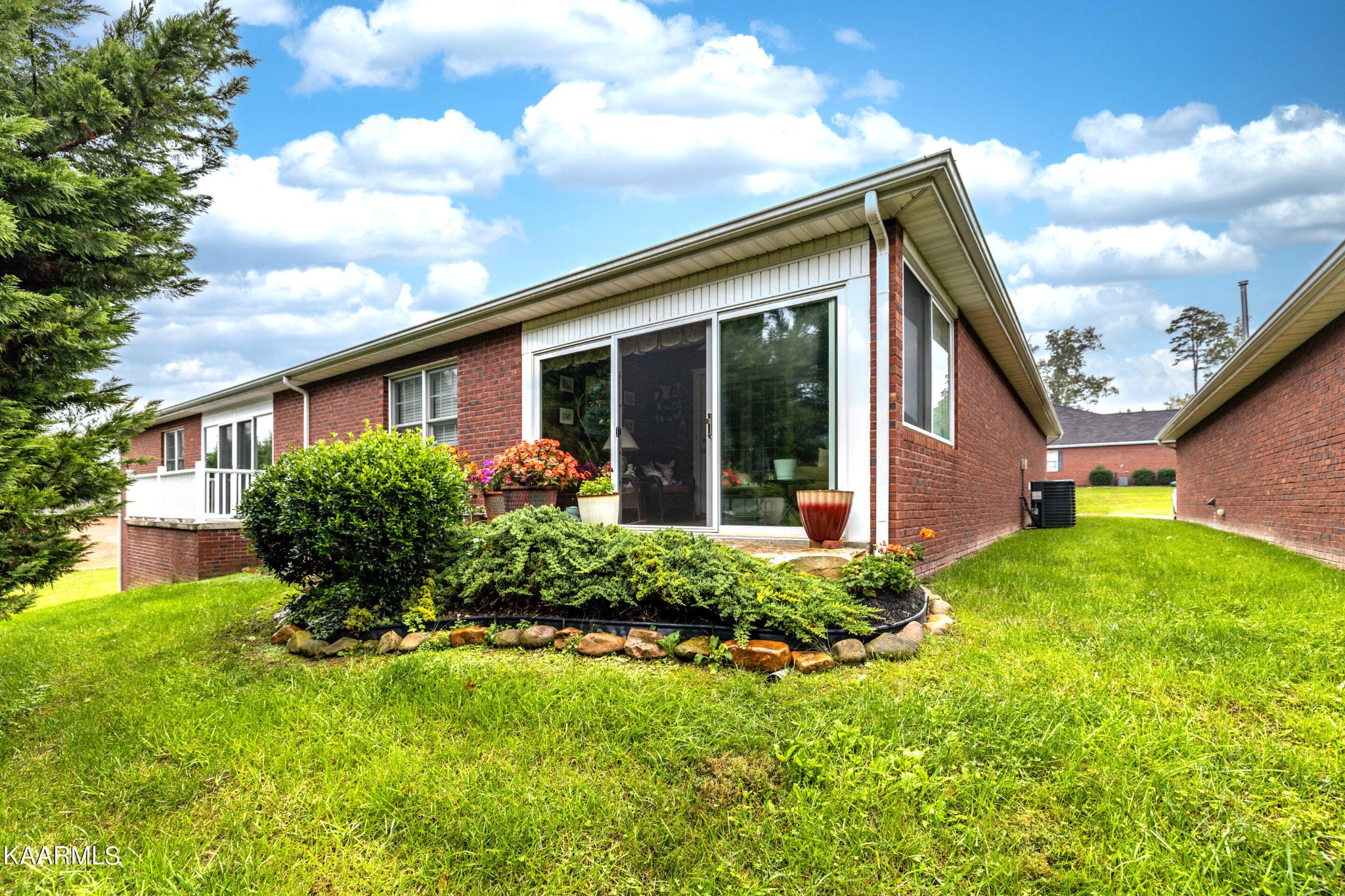 9043 Rocky Ridge Way, Unit 9 Knoxville, TN 37924 - Photo 28 of 31 a view of a house with backyard and garden