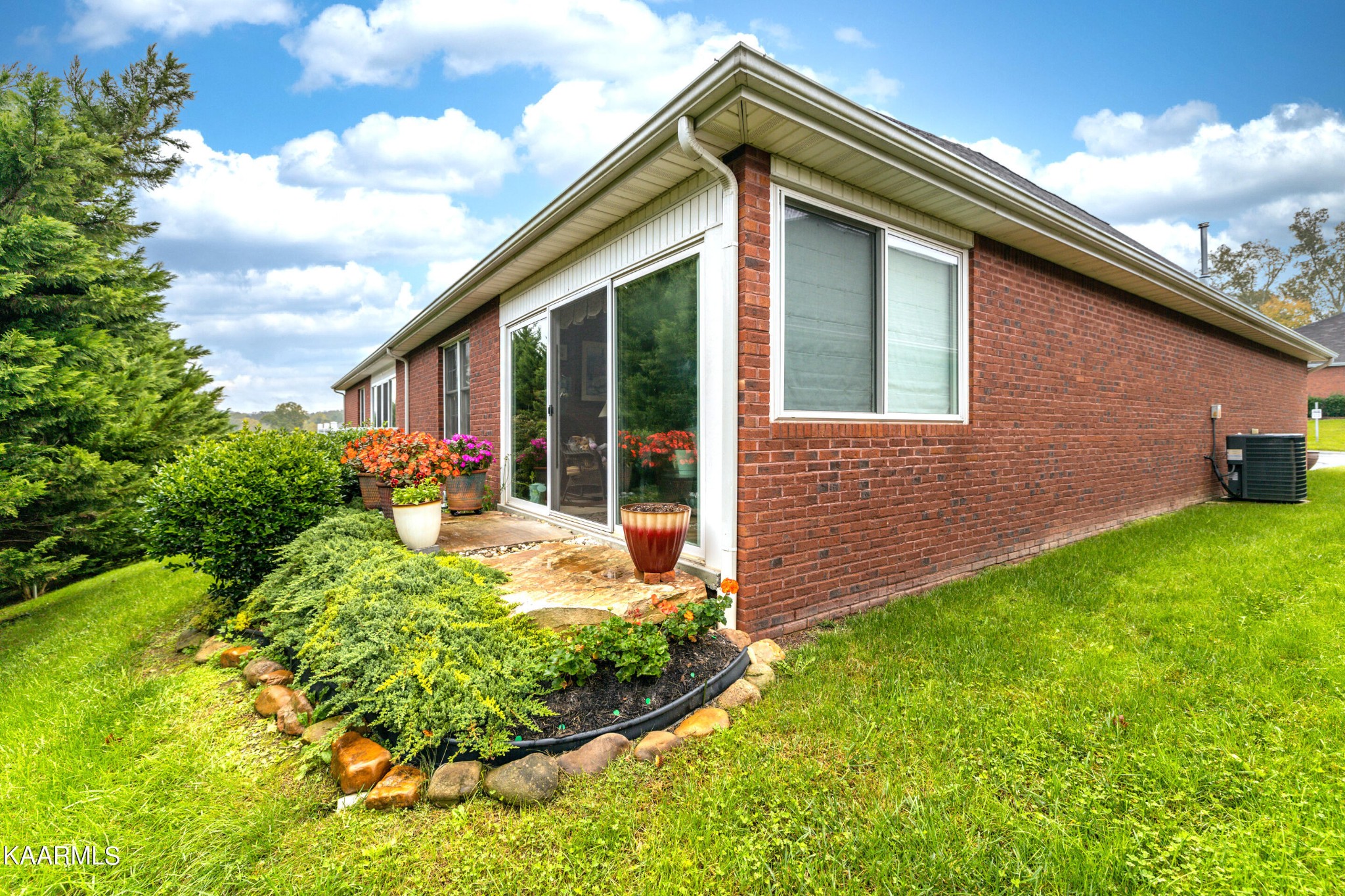 9043 Rocky Ridge Way, Unit 9 Knoxville, TN 37924 - Photo 29 of 31 a view of house with backyard and garden