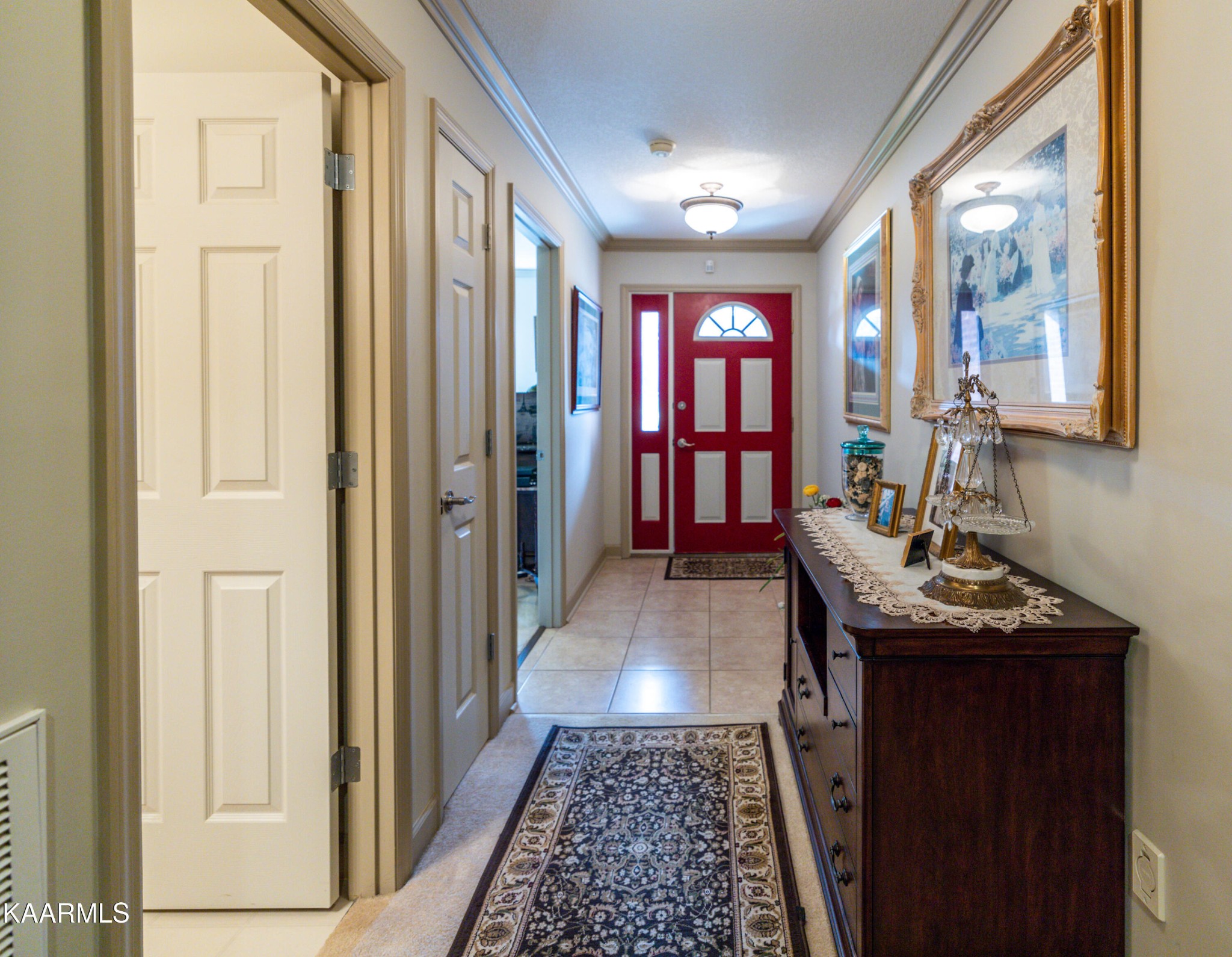 9043 Rocky Ridge Way, Unit 9 Knoxville, TN 37924 - Photo 3 of 31 a view of a hallway with furniture and window
