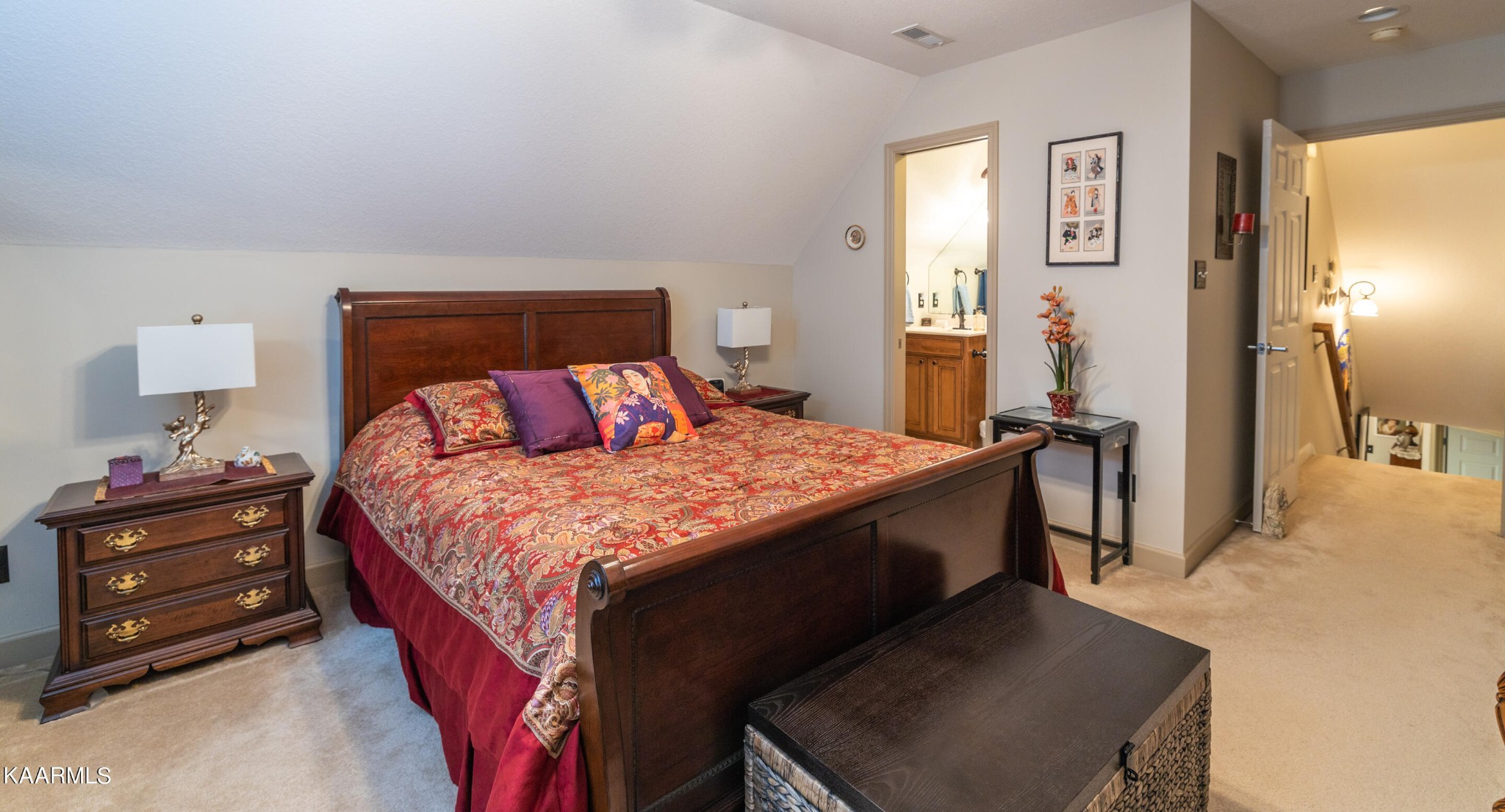 9043 Rocky Ridge Way, Unit 9 Knoxville, TN 37924 - Photo 9 of 31 a bedroom with a bed and a lamp with mirror