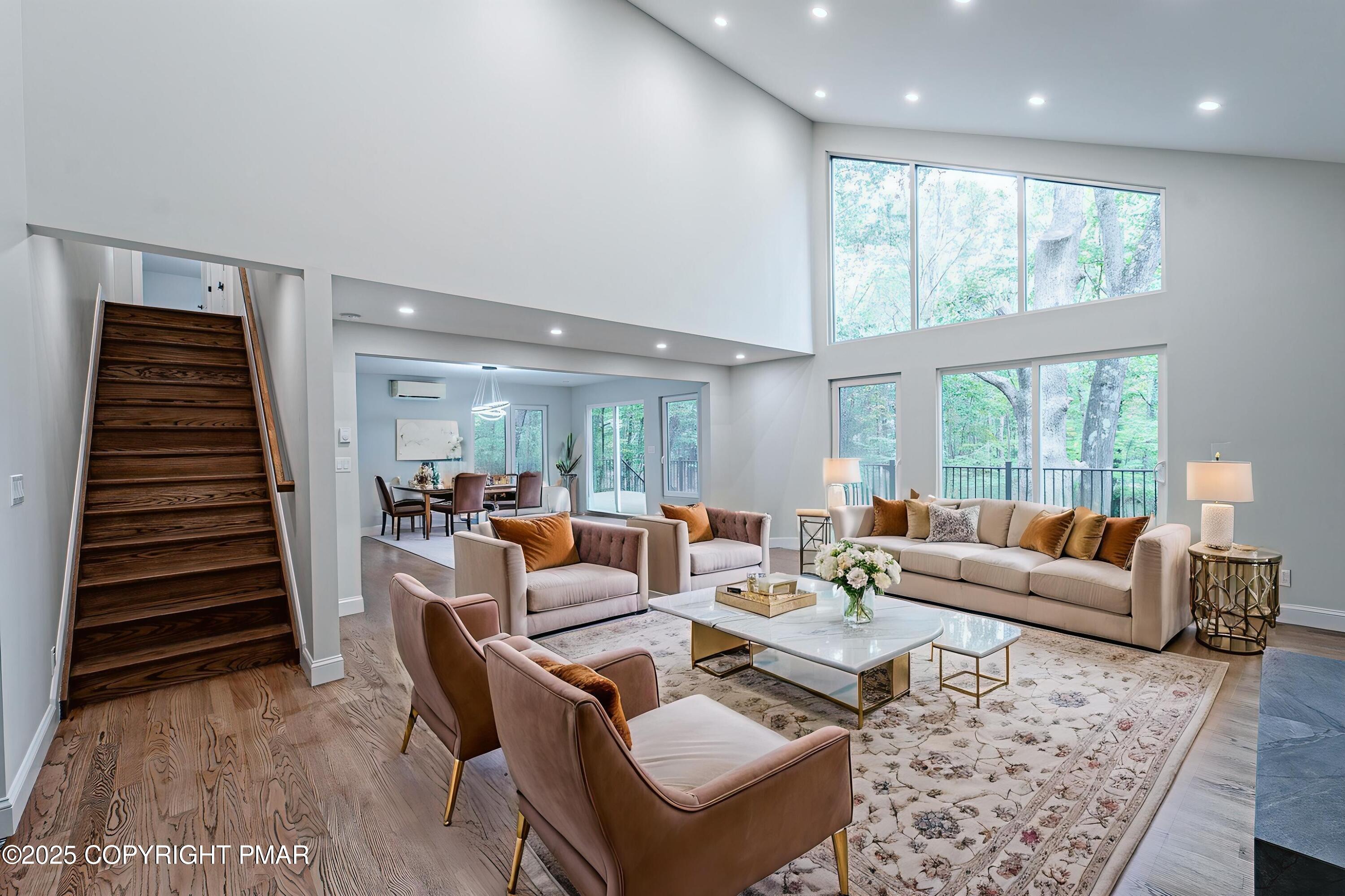 5806 Decker Road Bushkill, PA 18324 - Photo 14 of 76 a living room with furniture and a large window