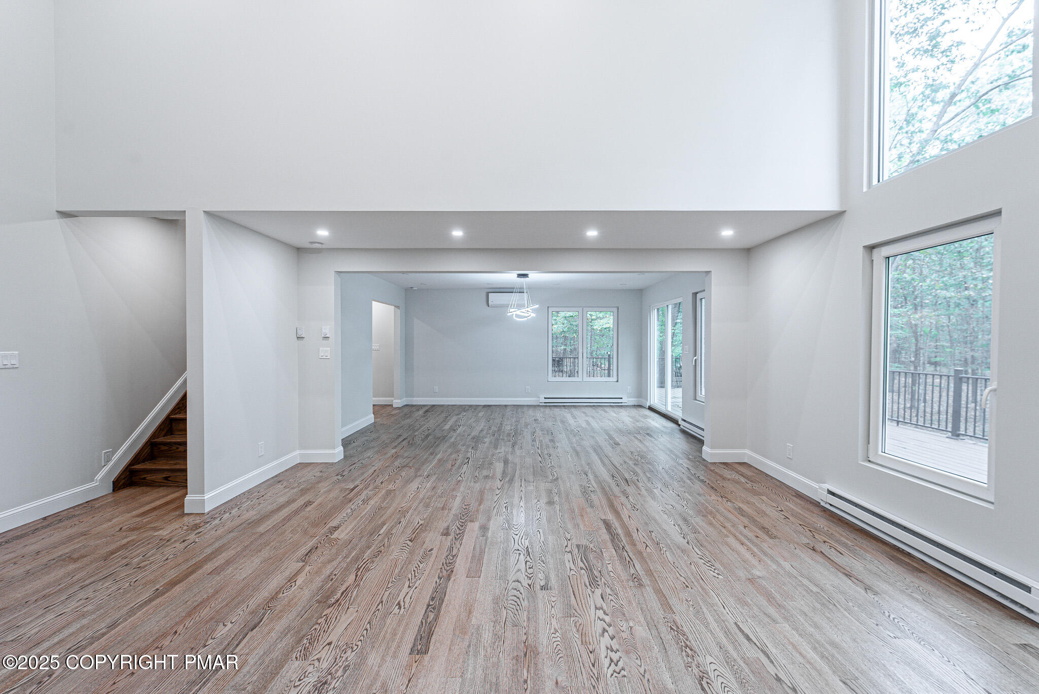 5806 Decker Road Bushkill, PA 18324 - Photo 17 of 76 wooden floor in an empty room with a window
