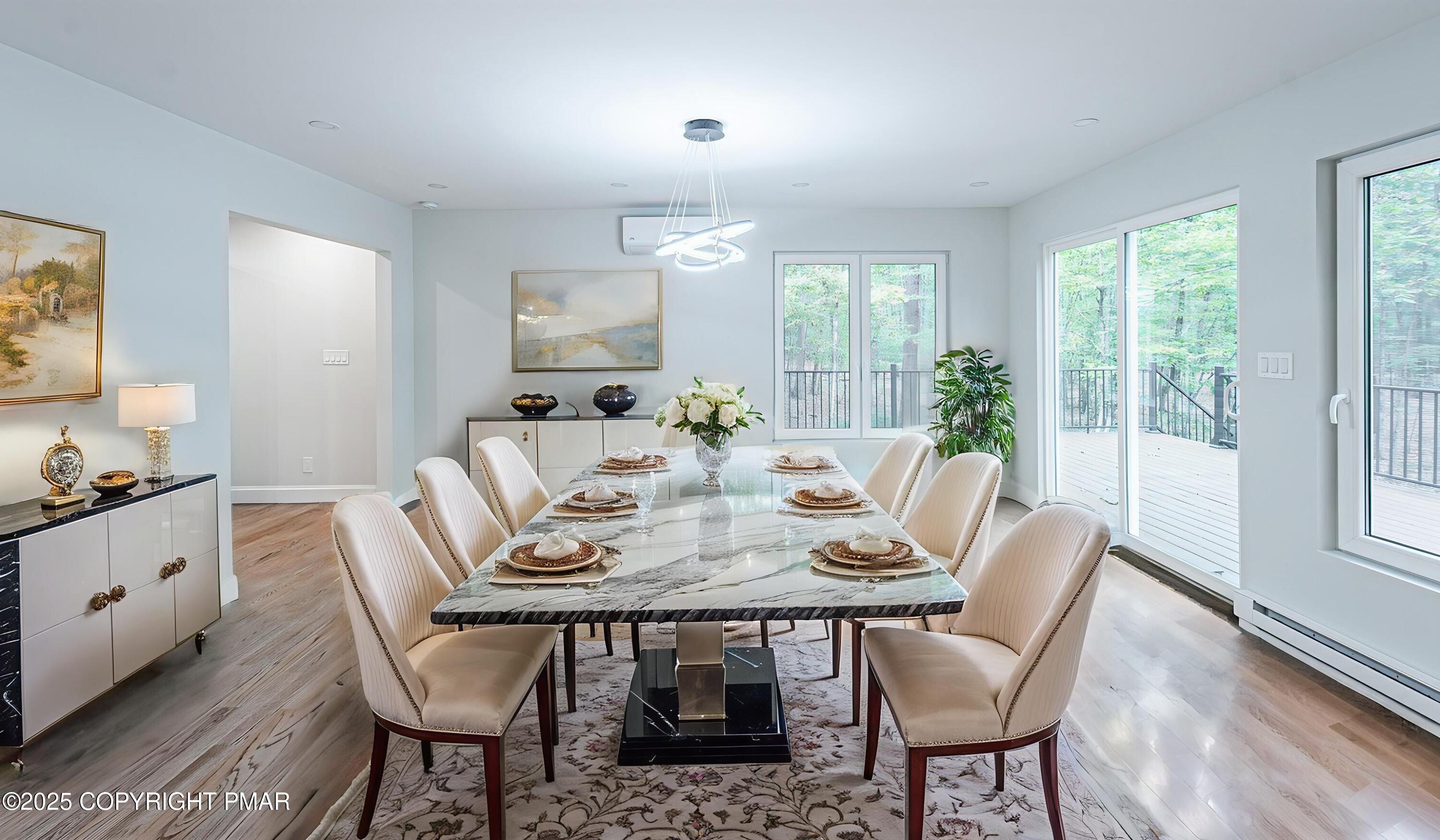 5806 Decker Road Bushkill, PA 18324 - Photo 19 of 76 a view of a dining room with furniture window and outside view
