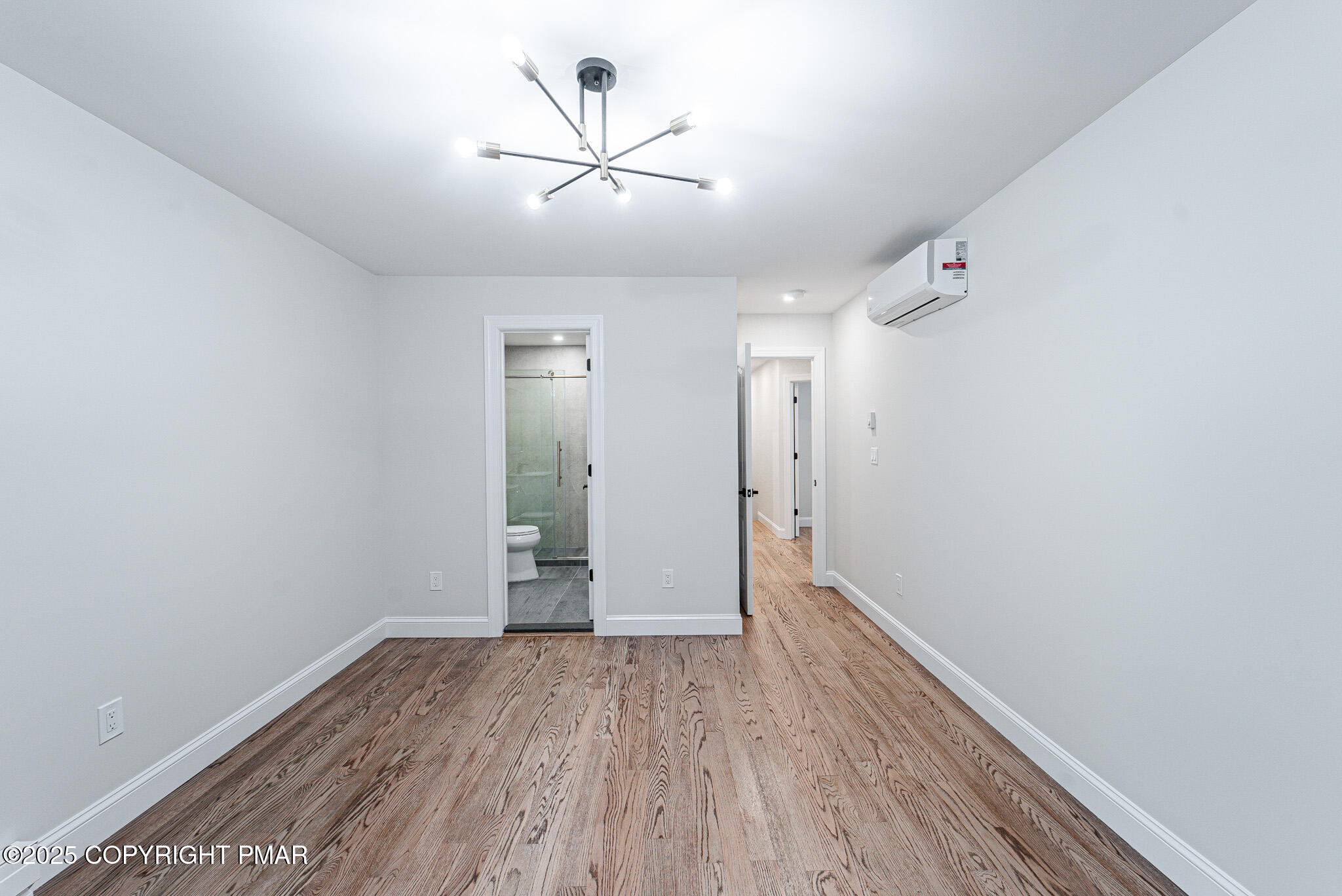 5806 Decker Road Bushkill, PA 18324 - Photo 47 of 76 a view of room with hardwood floor and ceiling fan