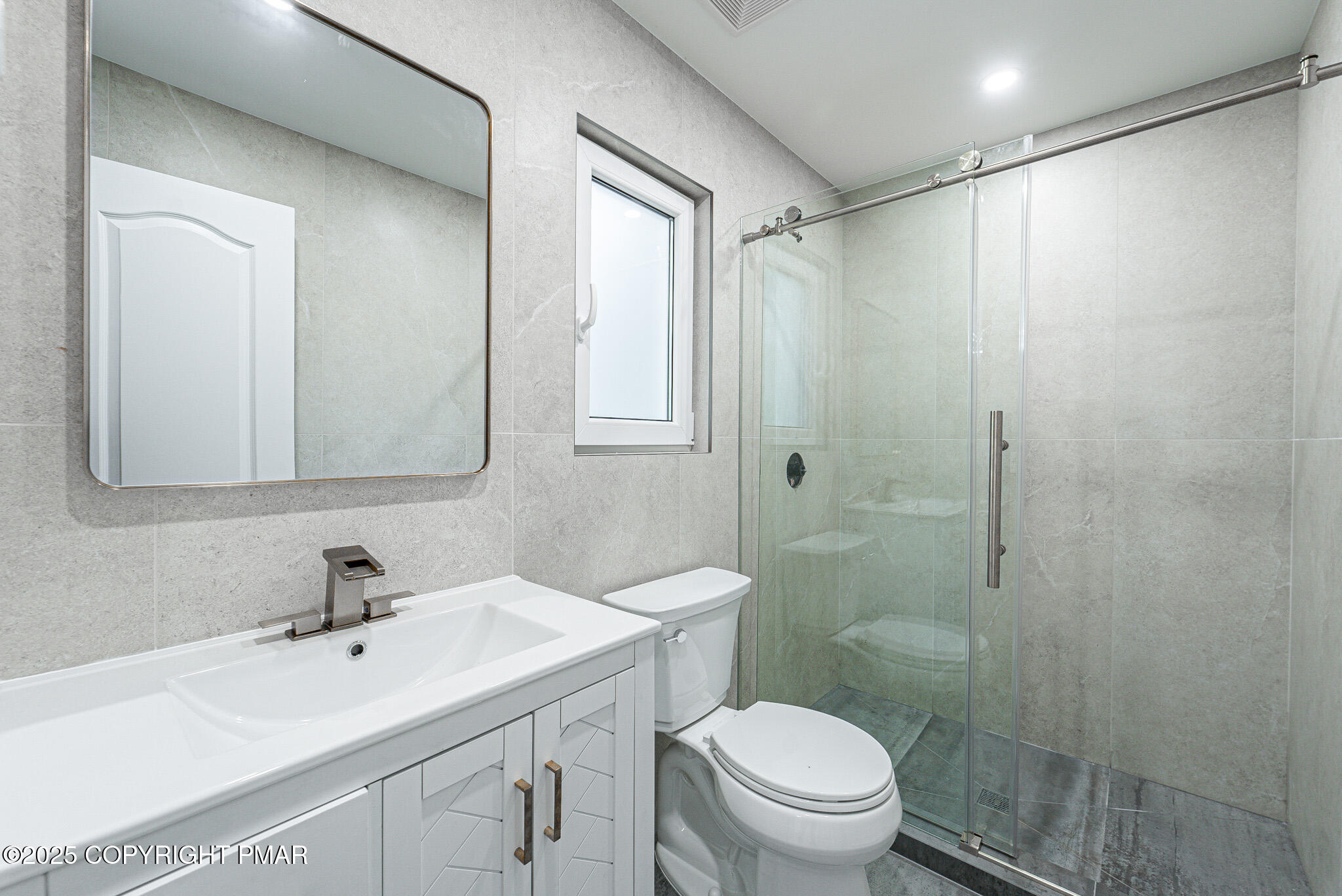 5806 Decker Road Bushkill, PA 18324 - Photo 49 of 76 a bathroom with a sink toilet and shower