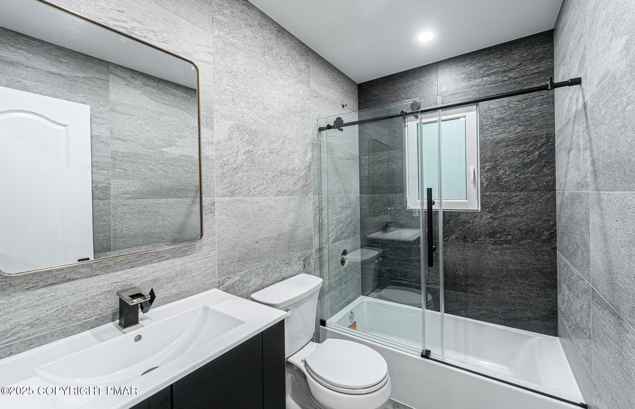 5806 Decker Road Bushkill, PA 18324 - Photo 58 of 76 a bathroom with a sink mirror toilet and shower